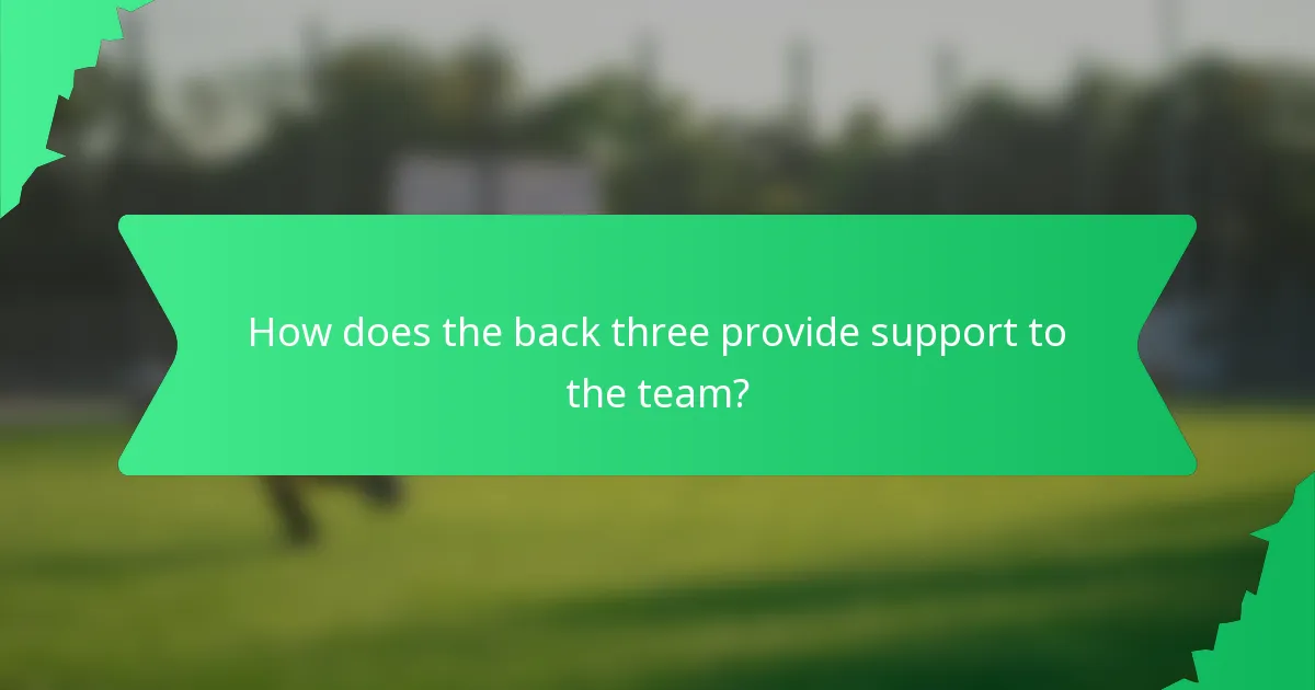 How does the back three provide support to the team?